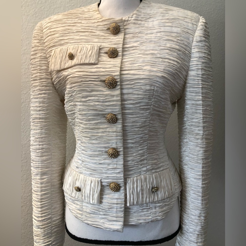 Ivory Jacket w/  rhinestone buttons w/ textured/ribbed / gathered fabric.